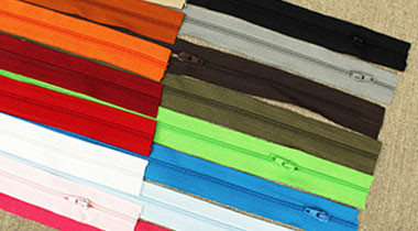 Fermetures à glissière non séparables avec curseurs au mètre